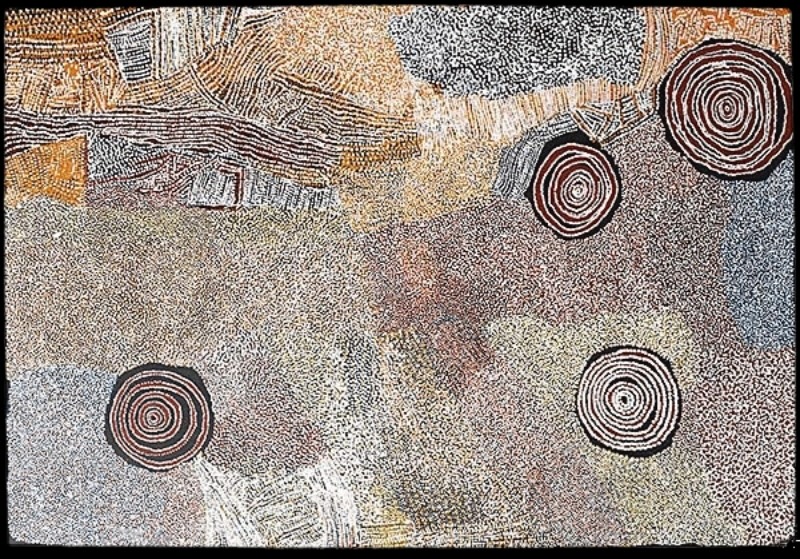 Rock Holes and Country Near the Olgas c. 2007 by Bill Whiskey Tjapaltjarri, showing four concentric rockholes across a vast field of finely dotted Country.