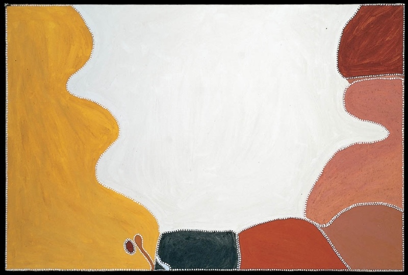 Freddie Timms Lake Argyle, 1994, ochre painting with a vast white central field bordered by yellow, red, pink, brown and black forms outlined with fine dots