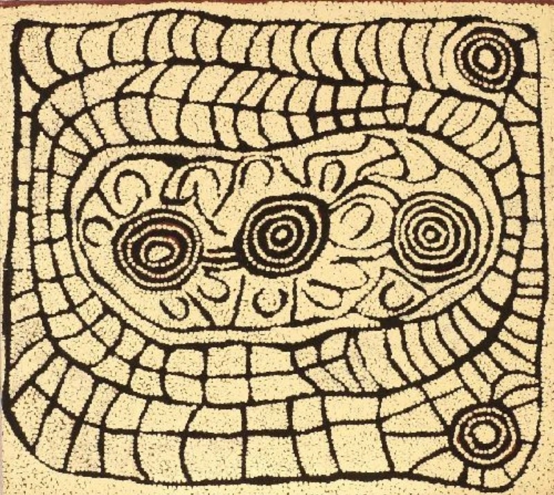 Cream and black Aboriginal painting by Ningura Napurrula with three large concentric circles arranged across an oval central area and smaller U-shaped motifs surrounding them. Broad curved bands divided into irregular grid-like compartments wrap around the centre, with additional concentric circles at the upper right and lower right corners.