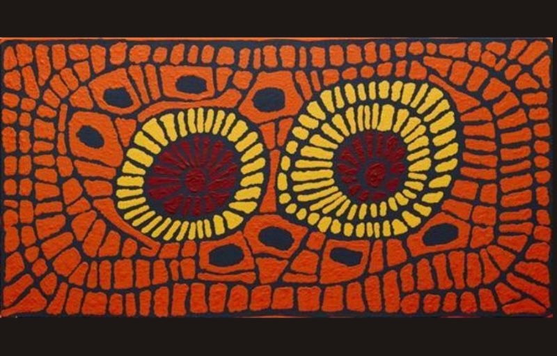 Ningura Napurrula Untitled, 2013, featuring two large circular forms surrounded by dense orange, yellow, red and dark geometric patterning.