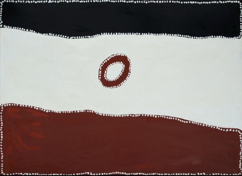 Minimalist Aboriginal painting with three broad horizontal bands. A solid black band spans the top, a wide cream band fills the centre, and a deep reddish-brown band stretches across the bottom. A single small reddish-brown ring with a cream centre floats in the middle of the composition. Fine white dots outline the coloured bands, the circular motif and the outer border, creating a simple and balanced abstract design.