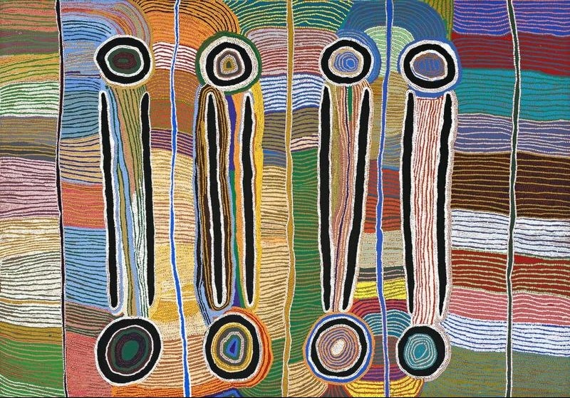 Maggie Watson Napangardi painting with four long black digging-stick forms connecting large concentric circles, set against flowing bands of green, blue, orange, pink, yellow and white lines.