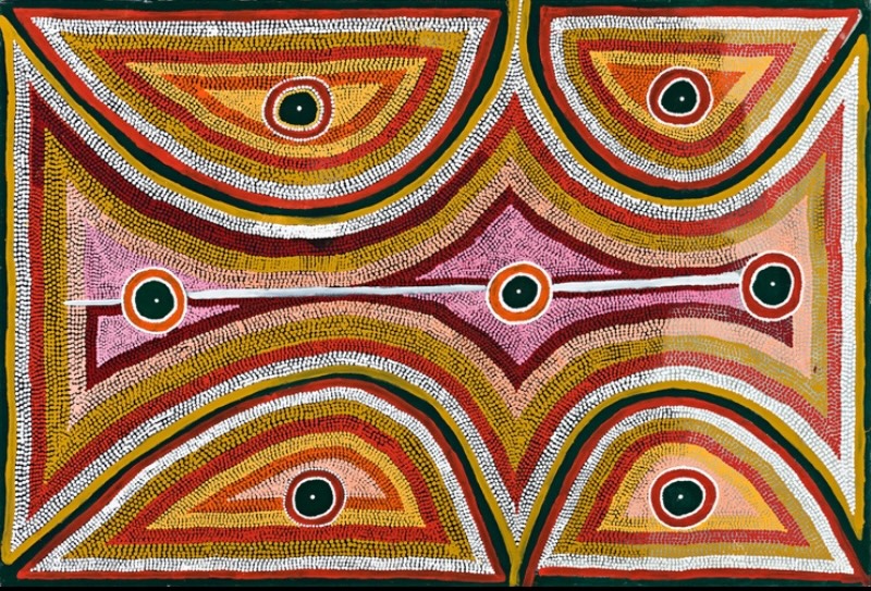 Boxer Milner’s Rainbow Dreaming Near Purkitji (Sturt Creek) (1999), with seven circular motifs surrounded by sweeping bands of red, yellow, pink, green, white and ochre dots.