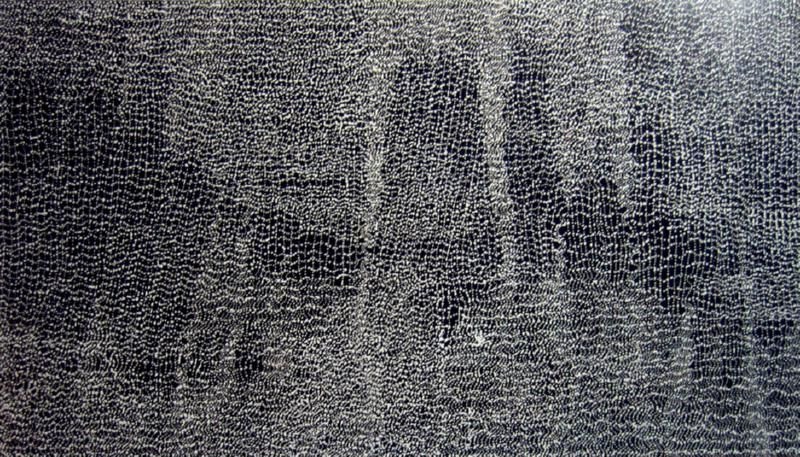 Dorothy Napangardi Warlpiri Salt Crystals of Mina Mina 2001 acrylic on linen featuring shimmering white dotted grids on a black ground representing the salt crystals and ancestral pathways of Mina Mina.