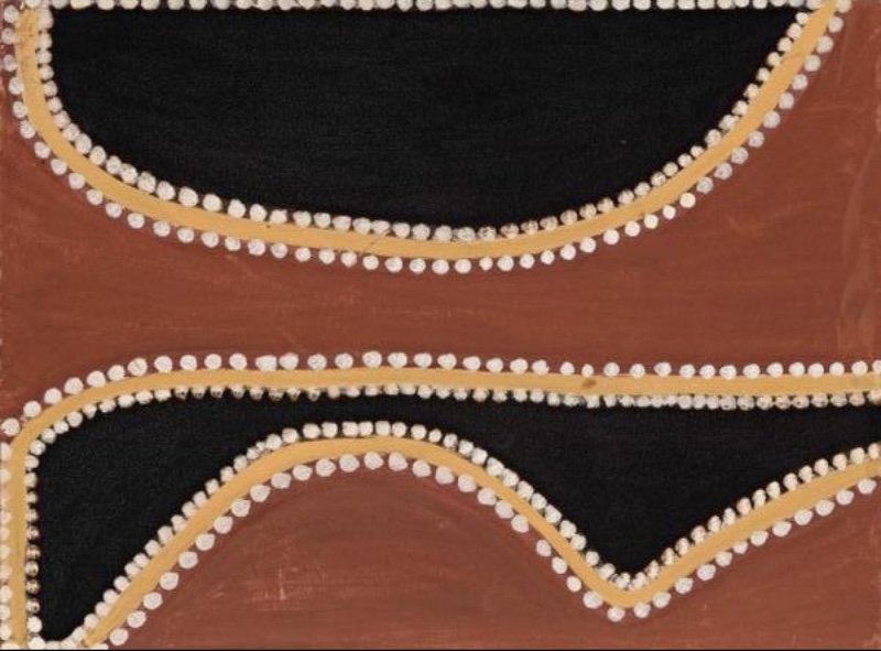 Abstract Rover Thomas painting divided into broad red-brown and black areas. Two large curved black shapes enter from the top and bottom edges, each bordered by rows of round white dots and a continuous yellow ochre line. A horizontal black band crosses the lower half, while the surrounding ground is warm reddish brown.