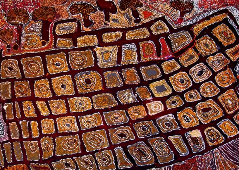 Wimmitji Tjapangarti's Untitled (Artist's Country), with rows of rectangular and circular dotted forms divided by dark red pathways across an ochre, white and brown composition.