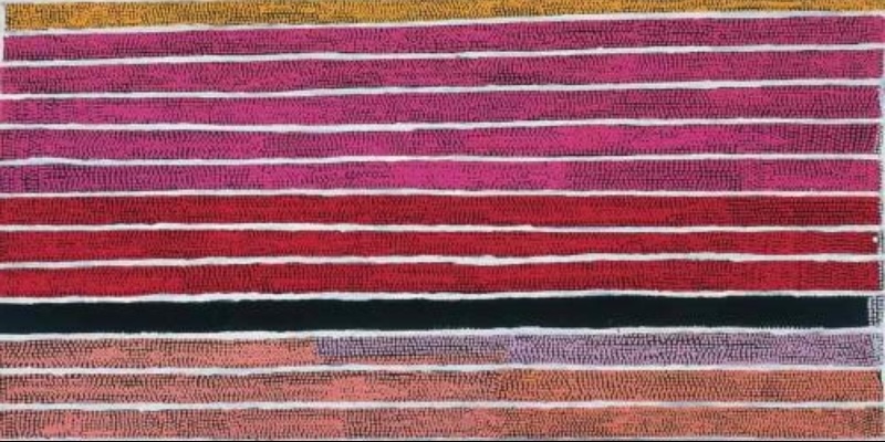 Boxer Milner’s Water Channels at Sturt Creek (2000), with long parallel bands of pink, red, orange and white divided by a dark blue line representing the main channel of Sturt Creek.