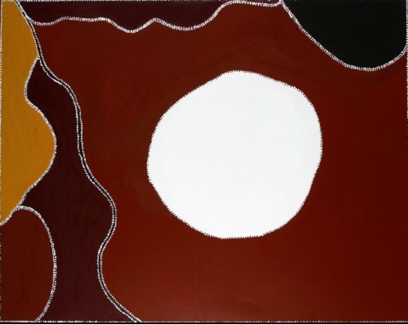 Freddie Timms Lissadell Station, 1995, ochre painting with a large white water soakage surrounded by deep red, black, brown and yellow Country