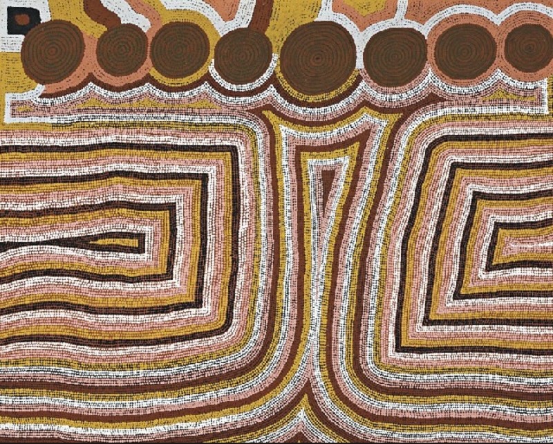 Ronnie Tjampitjinpa’s Kwala at Tjiterlunga (1988), featuring large layered rectangular forms made from parallel bands of white, ochre, pink, brown and black, beneath a row of eight concentric circles.