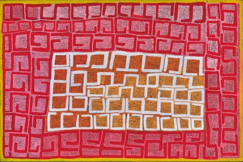 Boxer Milner’s Purkitji (2005), with a central field of orange geometric forms outlined in white, surrounded by a larger red field filled with pink dotted rectangular and hooked designs.