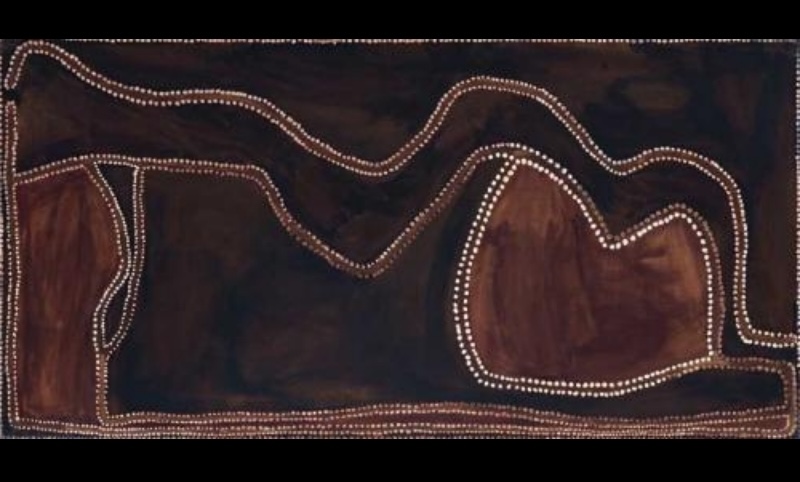 Rover Thomas ochre painting with a dark sweeping landscape crossed by undulating white-dotted lines, with large brown landforms outlined in white dots.