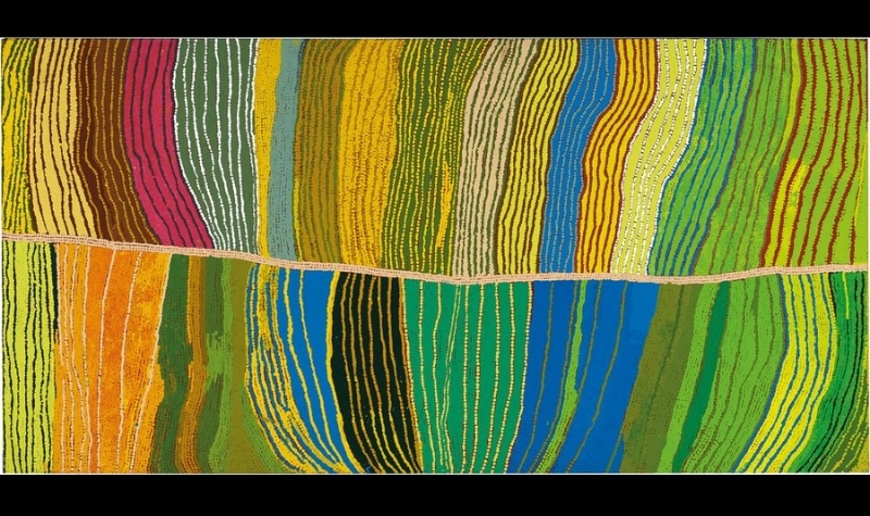 Maggie Watson Napangardi painting of dense vertical bands of flowing yellow, green, blue, orange, pink and white lines divided horizontally by a single pale hair-string motif.