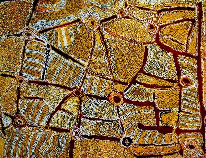 Wimmitji Tjapangarti's Untitled (Artist's Country), 1990, with dark red pathways connecting circular sites through densely dotted fields of yellow, ochre, white and grey.