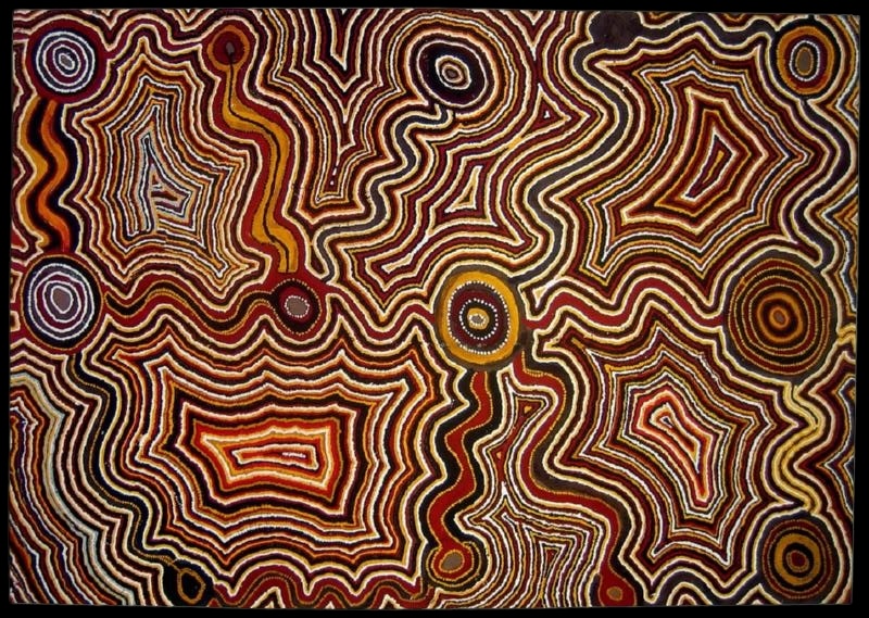 Tjumpo Tjapanangka Wangapanta 1990, with concentric circles and densely layered winding lines in red, ochre, black and white representing Kangaroo Dreaming Country.
