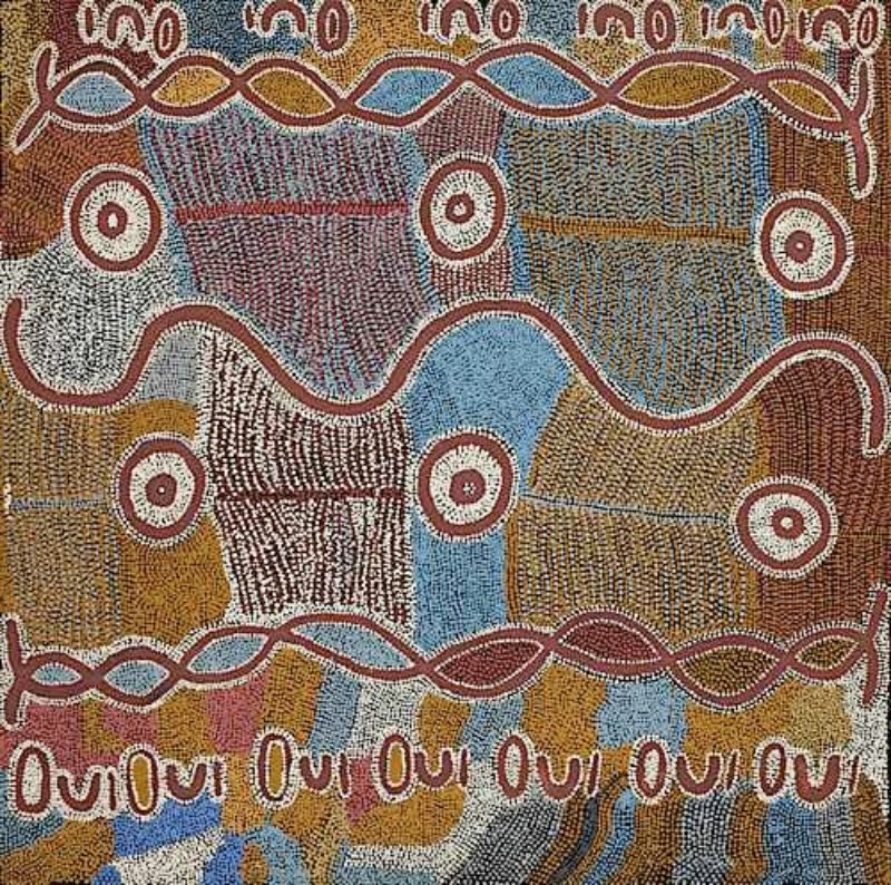 Maggie Watson Napangardi painting with concentric circles, long looping vine-like forms and dense fields of blue, white, ochre and brown dots arranged across a square canvas.
