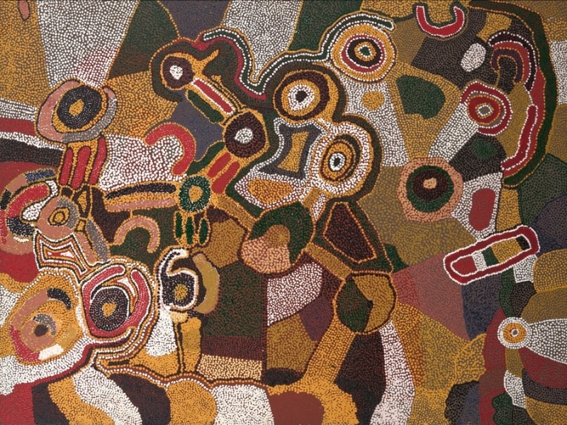 Wimmitji Tjapangarti's Tingarri, 1990, with concentric circles, curved ancestral forms and dense fields of fine dots in ochre, white, red, green and brown.