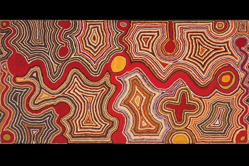Tjumpo Tjapanangka Ngunkanapilka, West of Lake Mackay 1991, with red pathways, circular forms and layered geometric patterns in ochre, black and white.