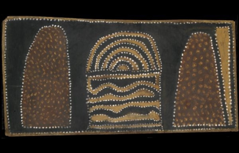 Untitled by Paddy Jaminji, late 1984, a Warmun painting in natural earth pigments on plywood with hills, water and concentric forms.