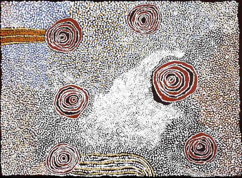 Rock Holes Near the Olgas 2008 by Bill Whiskey Tjapaltjarri, with six concentric rockholes surrounded by dense white, blue and ochre dotting.
