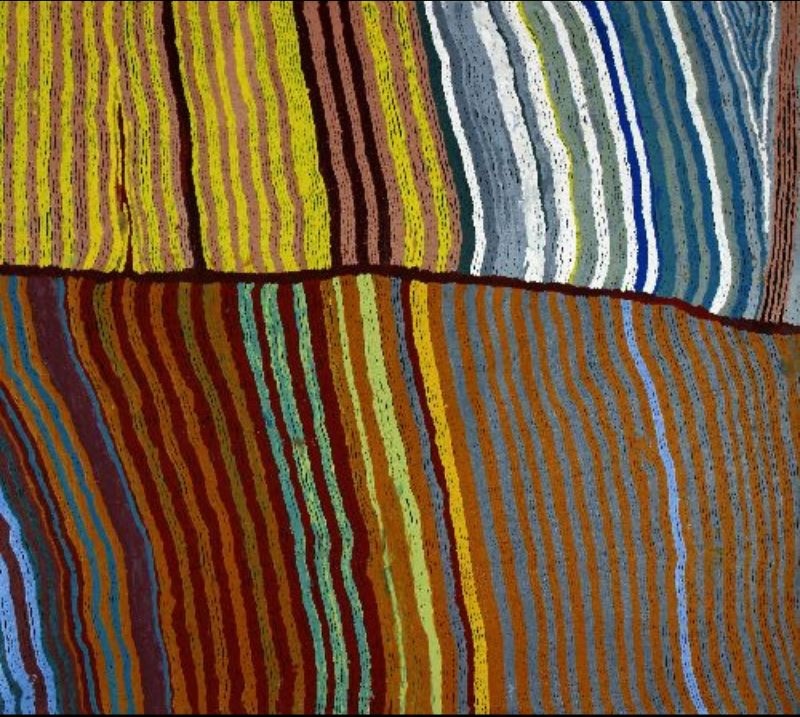 Judy Watson Napangardi painting Hairstring Dreaming, 2000, with broad fields of closely spaced rippling lines in yellow, green, orange, red, blue, grey and white divided by dark curving bands.