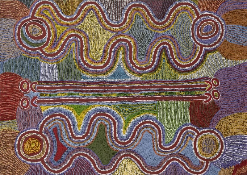 Maggie Watson Napangardi painting with two large undulating forms linking concentric circles and a central group of long parallel digging-stick motifs, surrounded by dense fields of multicoloured dots.