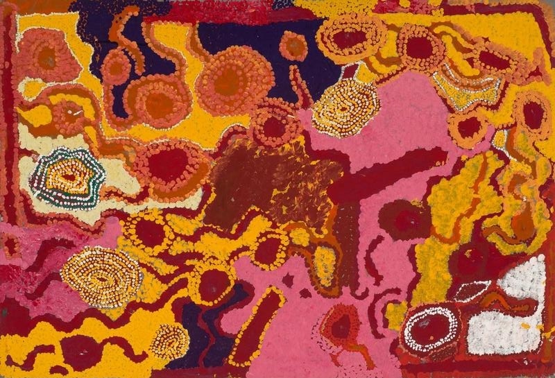 Wimmitji Tjapangarti's Artist's Country (Kunkutjarra), 1993, an intensely coloured painting of interconnected circular and irregular forms in pink, red, yellow, orange, purple and white representing features of Country.