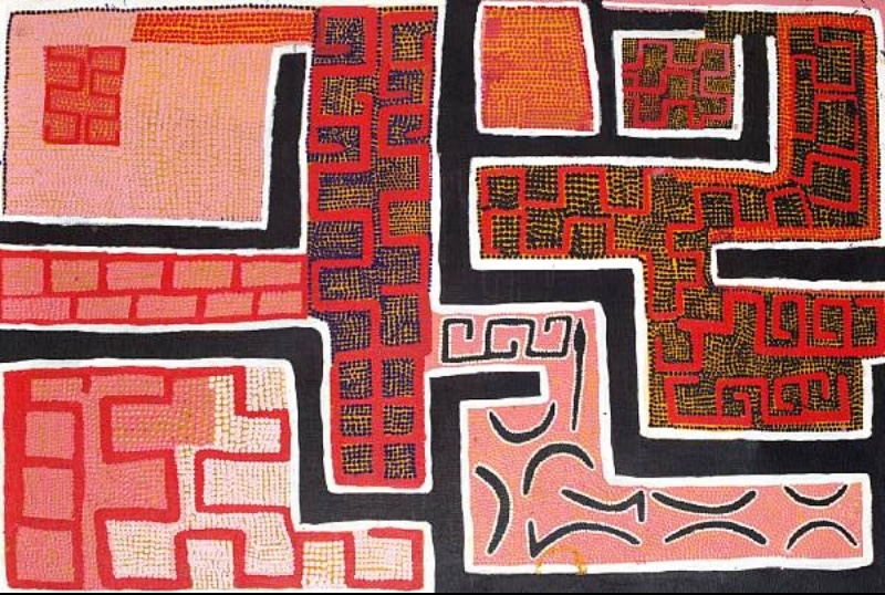 Boxer Milner’s Purkitji (2005), showing irregular pink, red and orange geometric fields separated by broad black and white pathways, with dense dotted grids and hooked forms throughout.