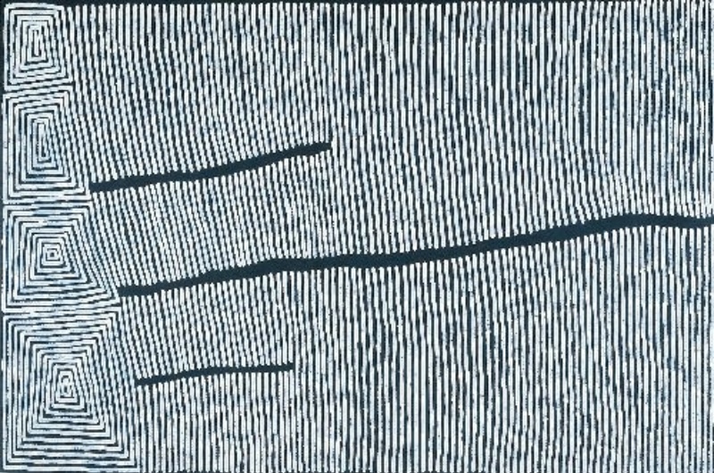 Ronnie Tjampitjinpa Tingari – Fire Story 2004 painting, with dense vertical white lines, sweeping black bands and four concentric geometric motifs along the left edge.