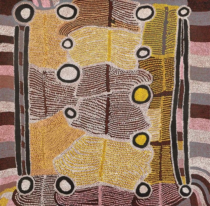 Maggie Watson Napangardi painting with tall black digging-stick forms, circular waterhole motifs and dense fields of white, yellow, pink and brown dots arranged in flowing parallel bands.