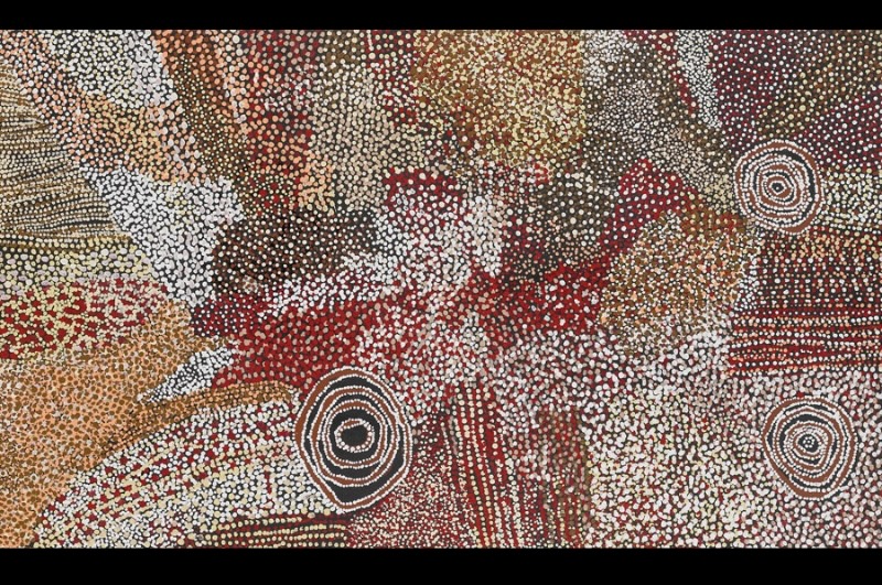 Rockholes Near the Olgas 2006 by Bill Whiskey Tjapaltjarri, showing three concentric rockholes amid densely dotted ancestral Country near Kata Tjuta.