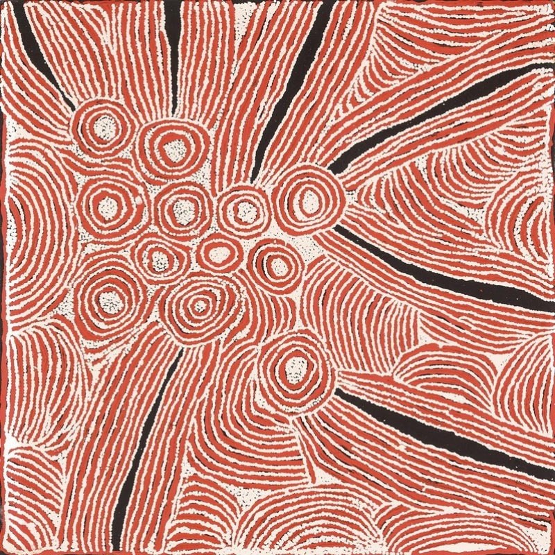 Square red, white and black Aboriginal painting by Ningura Napurrula with a cluster of twelve concentric circles extending diagonally through the centre. Dense bands of parallel red and white lines flow around the circles and across the canvas, separated in several places by long irregular black channels.
