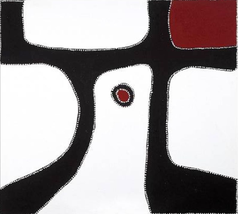 Abstract Aboriginal painting on a pale cream background. Thick black bands divide the composition into large irregular white spaces. A single deep red rectangular shape occupies the upper right corner, while a small red circle surrounded by a black ring appears near the centre. Fine white dots outline all black shapes and the outer border, creating a bold, high-contrast composition.
