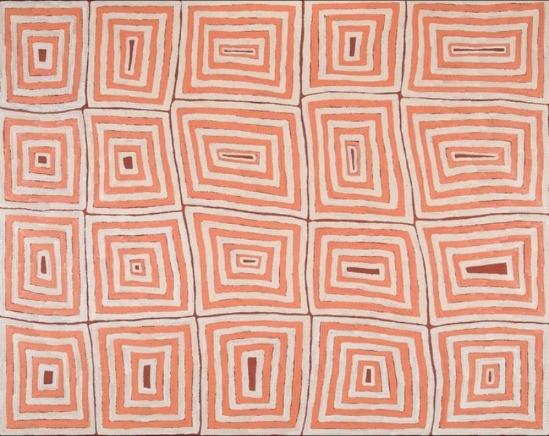 Ronnie Tjampitjinpa Tingari 1998 painting, composed of repeated red ochre and white concentric rectangular forms arranged in a geometric grid.
