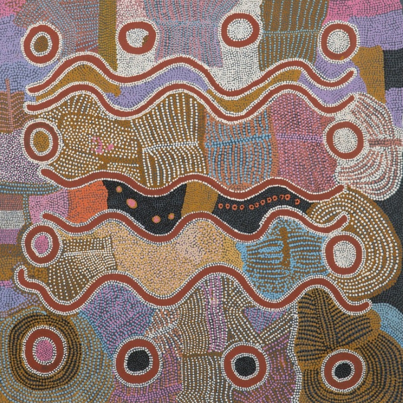 Maggie Watson Napangardi painting with concentric circular motifs connected by broad winding red and white lines across densely dotted fields of pink, blue, ochre, brown, black and white.