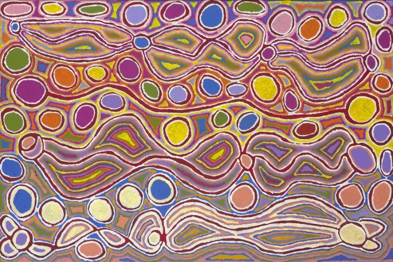 Colourful Judy Watson Napangardi painting filled with circular forms and flowing interlocking bands in purple, pink, yellow, blue, green, orange and white.