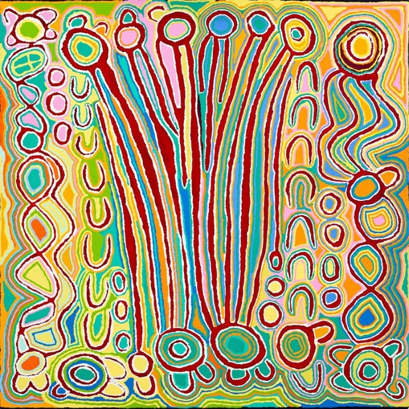 Aboriginal painting by Judy Napangardi Watson with long vertical bands of red, turquoise, yellow and green rising between circular forms, surrounded by concentric circles, U-shaped motifs and brightly coloured geometric designs.
