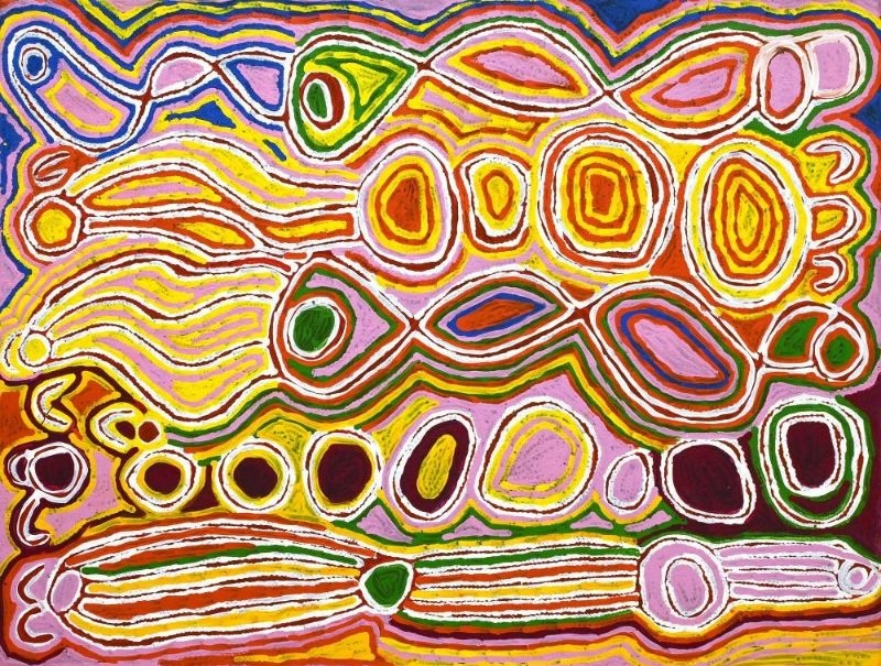 Colourful Judy Watson Napangardi painting with concentric circles, oval forms, flowing bands and repeated U-shaped motifs in yellow, pink, orange, green, blue, purple and white.