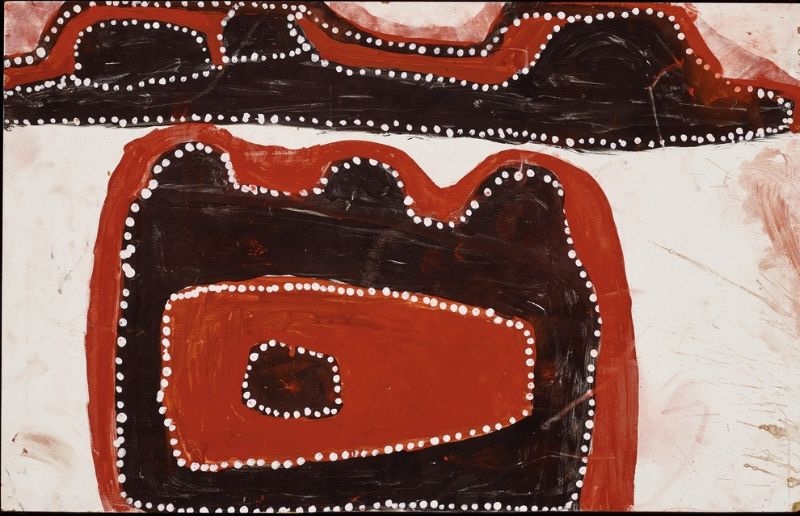 Abstract Aboriginal painting on a pale cream background. A large rectangular black shape with rounded corners fills the lower half, enclosing a red elongated oval with a smaller black oval at its centre. Across the top runs a long black horizontal band bordered by flowing red shapes. All major forms are outlined with evenly spaced white dots, creating strong contrast between the black, red, cream and ochre colours.