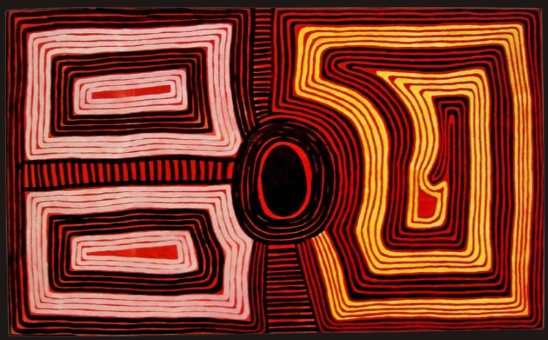 Ronnie Tjampitjinpa’s Two Women Dreaming at Kurakuratja (1994), featuring a central black oval surrounded by concentric bands and large rectangular linear forms in red, black, pink and yellow.