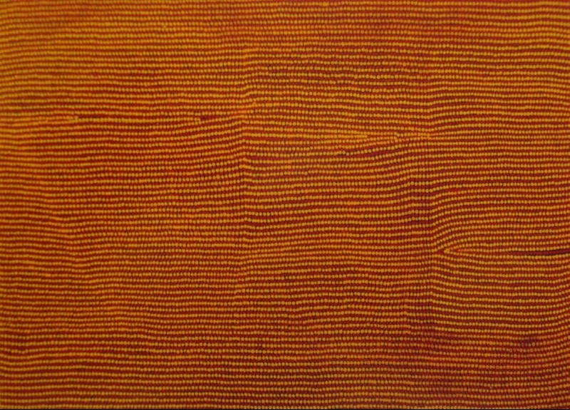 Turkey Tolson Tjupurrula Straightening Spears, c.1993. Aboriginal painting composed of hundreds of fine horizontal ochre, orange and brown lines extending across the canvas with subtle vertical shifts in tone.