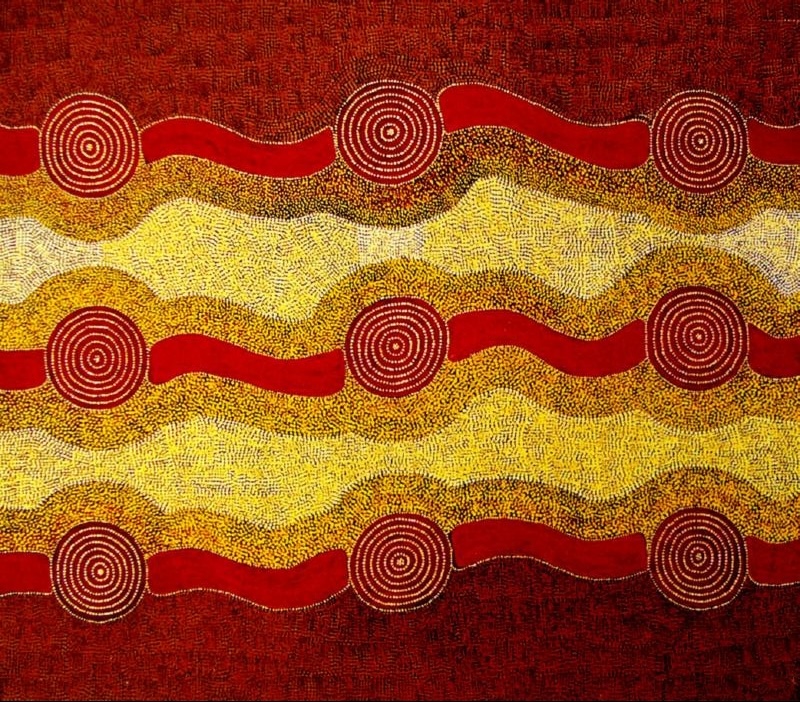 Turkey Tolson Tjupurrula Men's Ceremonies, 1986. Aboriginal painting with three horizontal wavy bands linked by concentric circles in red, ochre and cream on a deep red dotted background.
