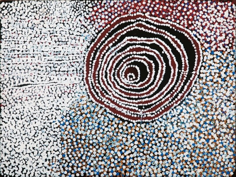 Rockholes and Country Near the Olgas 2008 by Bill Whiskey Tjapaltjarri, dominated by a large concentric rockhole surrounded by dense white and blue dotting.