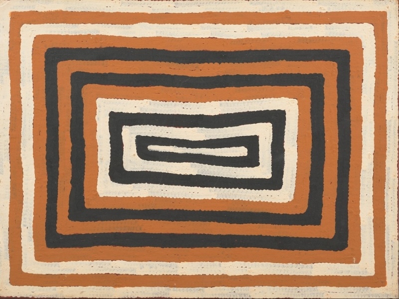 Ronnie Tjampitjinpa’s Untitled (1992), composed of nested rectangular bands of black, white and ochre surrounding a narrow central linear form.