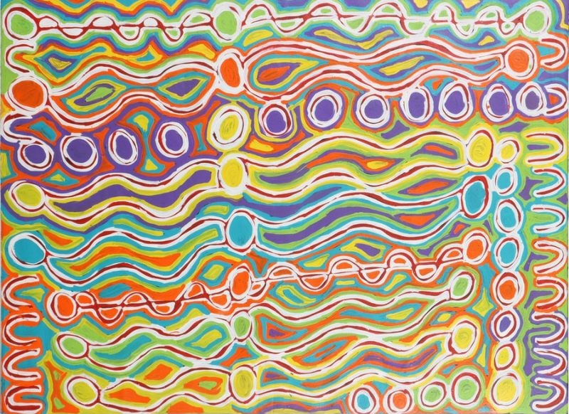 Colourful Judy Watson Napangardi painting filled with flowing horizontal bands, linked circular forms and repeated U-shaped motifs in green, orange, purple, blue, yellow and white.