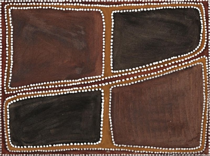 Rover Thomas painting divided into four large rectangular fields of dark brown, reddish brown and black. A diagonal red-brown band crosses a vertical band near the centre, forming a crossroads, with thick rows of white dots outlining the roads, each colour field and the edges of the canvas.
