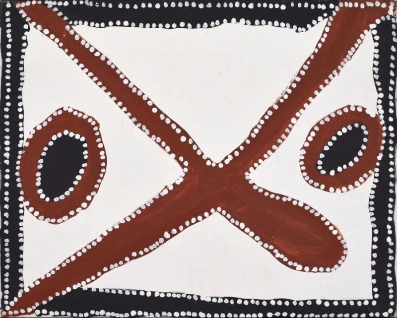Abstract Aboriginal painting with a cream background framed by a thick black border outlined with white dots. Two broad reddish-brown diagonal bands cross in the centre to form an X shape. A black oval outlined in reddish brown appears on both the left and right sides. The composition uses only black, reddish brown, cream and white, creating a bold geometric design with large open areas.