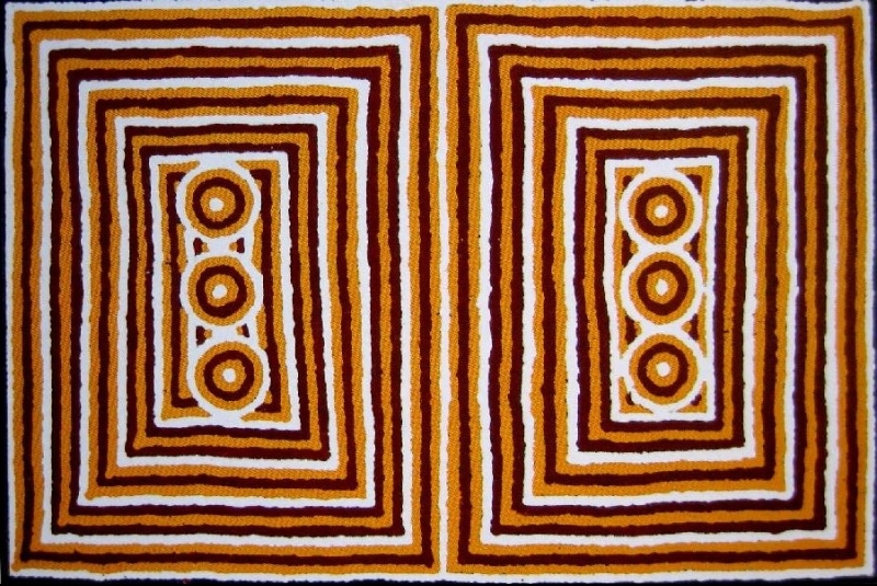Turkey Tolson Tjupurrula Woman's Dreaming, 1997. Aboriginal painting with two mirrored rectangular ceremonial designs enclosing three concentric circles on a white background.