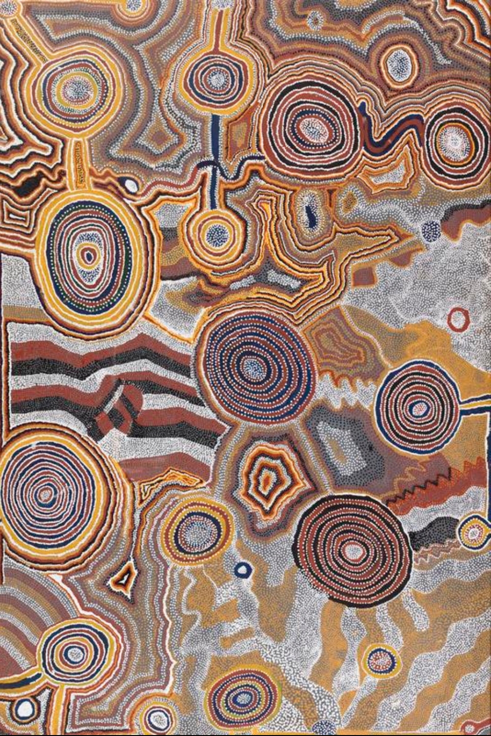 Tjumpo Tjapanangka painting with concentric circles, winding pathways and dense dotting in ochre, white, black and red, representing Western Desert Country.