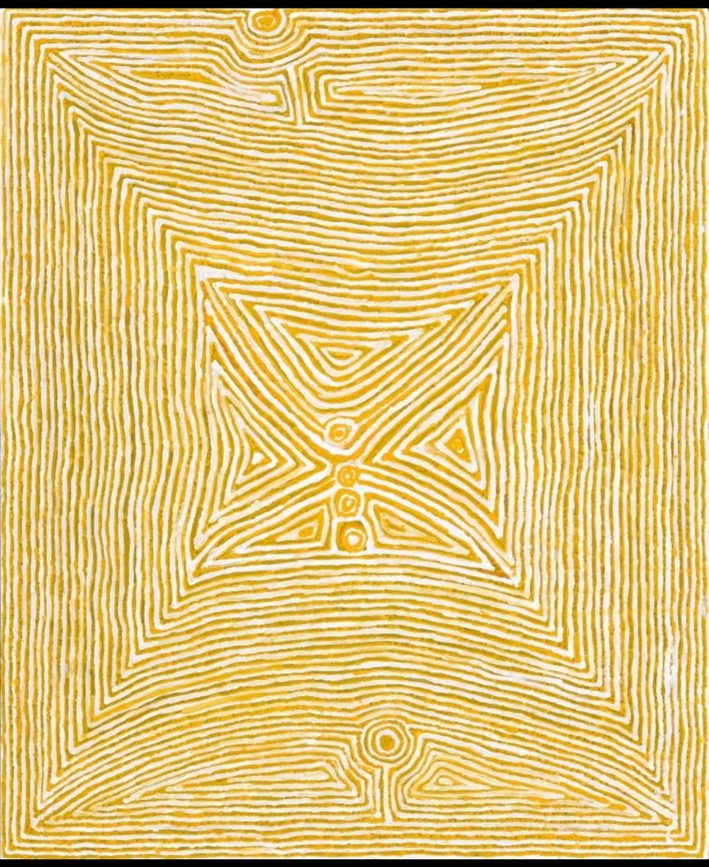 Tjumpo Tjapanangka painting with closely spaced yellow and white lines forming nested geometric shapes around circular forms on a pale ground.