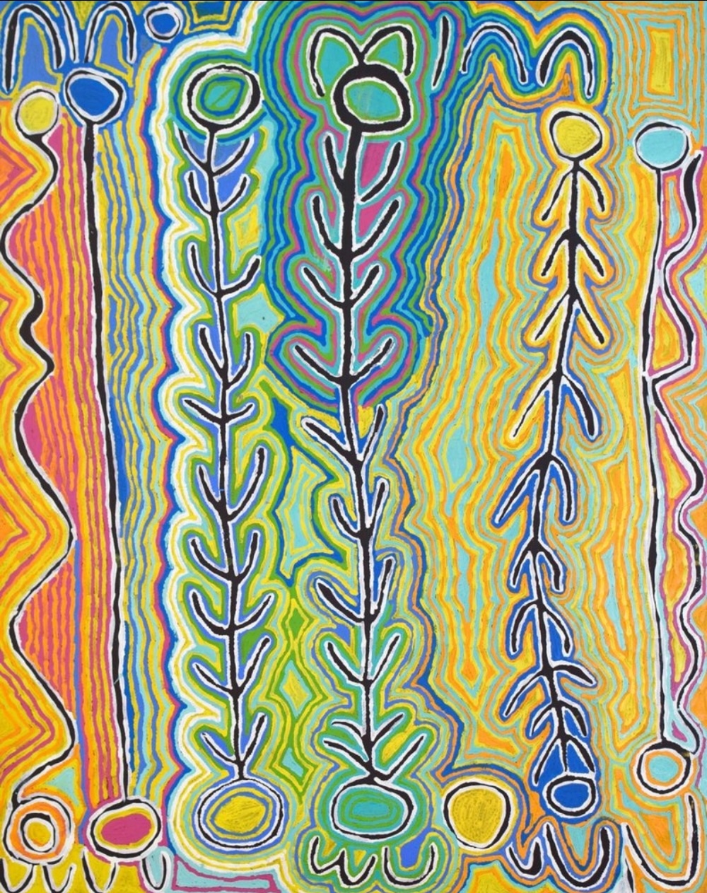 Colourful Judy Watson Napangardi painting with tall branching plant-like forms surrounded by flowing lines in yellow, green, blue, pink and orange.